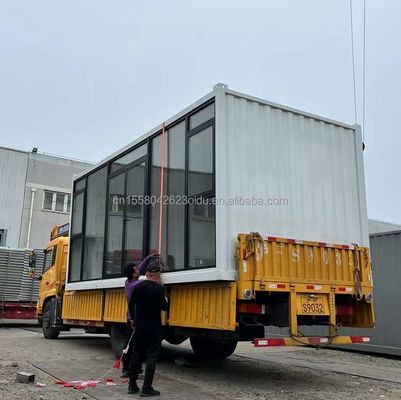 На заказ Цветовая стальная рама Оцинкованная стальная изгибающаяся 180г складная плоская упаковка контейнерный дом для проживания в общежитии
